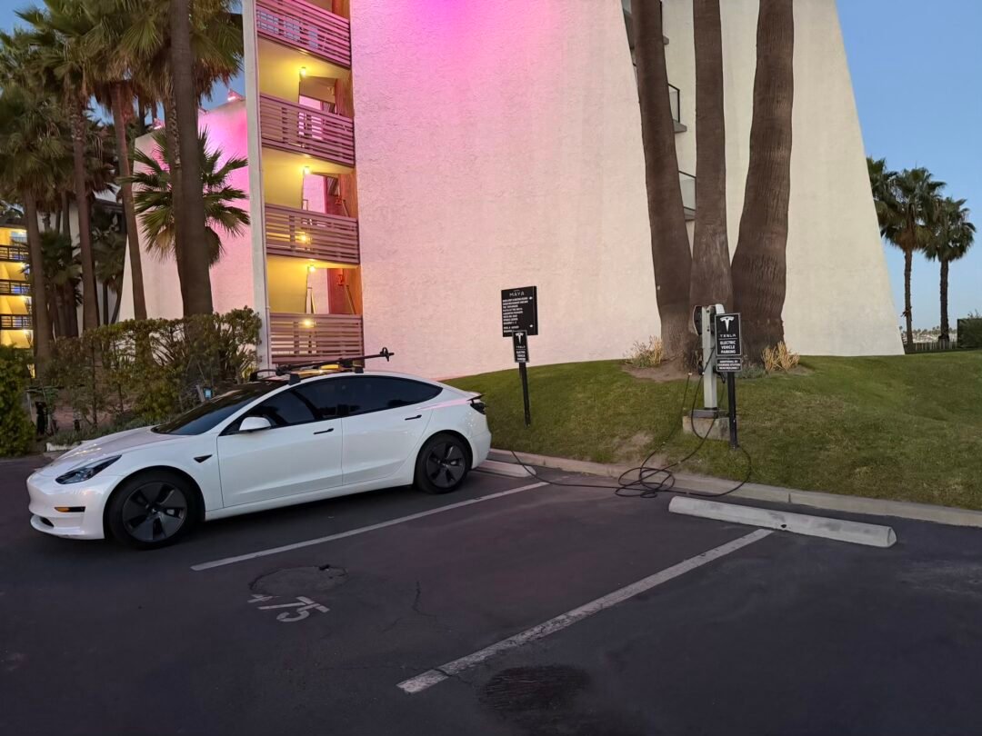 Tesla hotel charging Long Beach at Hotel Maya waterfront with skyline views